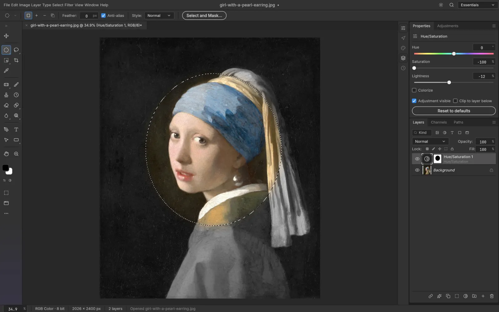 An elliptical selection used as the mask of a Hue/Saturation layer